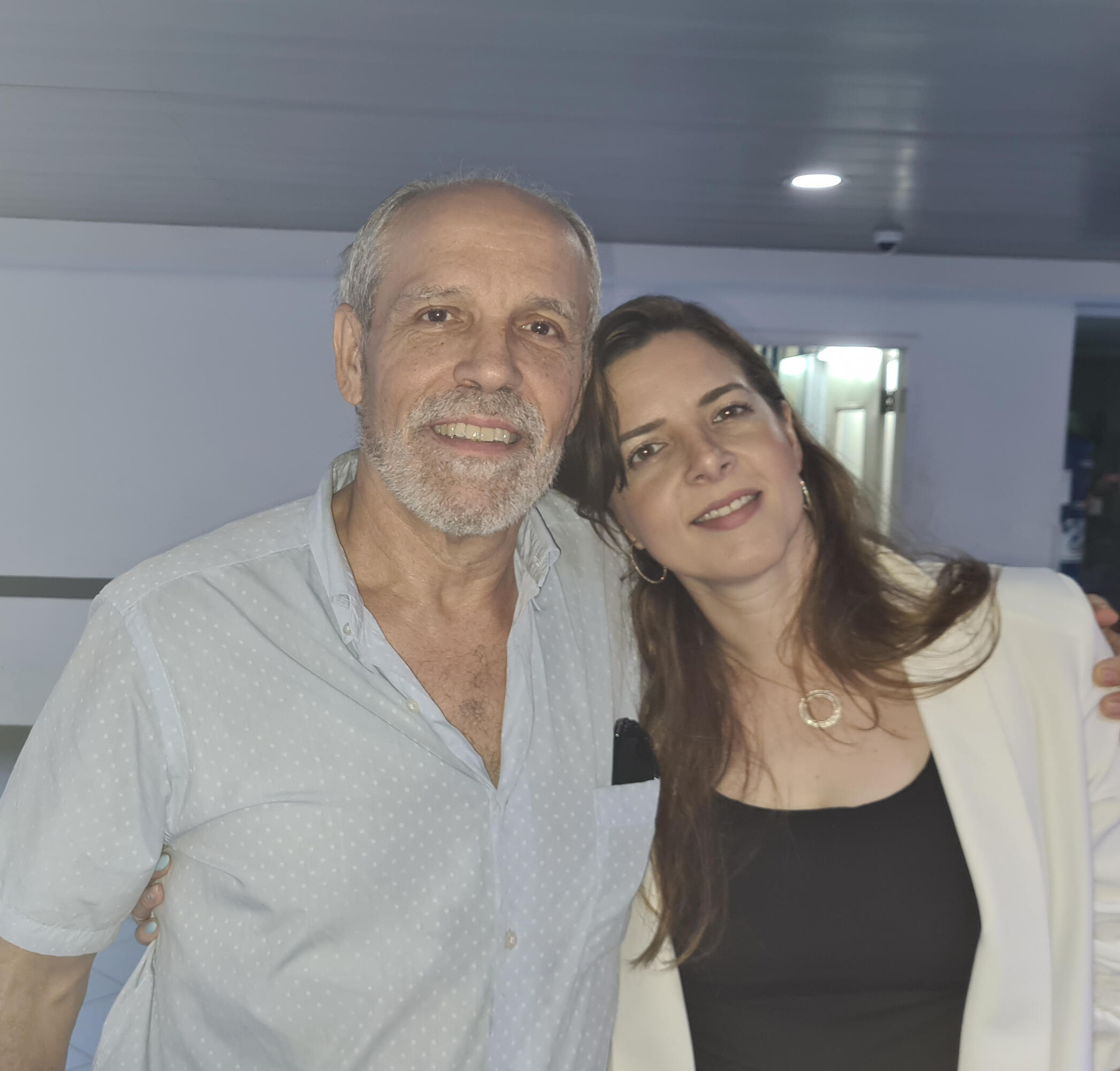 Sparky Nazaren's NFTart Artist Sparky Nazaren (Jorge Vidaurre-Arguello) and Dr. Carolina Vidaurre. The Story of Sparky Nazaren Art. Fine Art Prints.